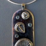 Ediacaran Under-sea-scape Sterling Silver Pendant with Dickinsonia, Parvancorina and Tribrachidium with Faceted Blue Topaz