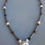 Tribrachidium Necklet - Sterling Silver, Garnet and Haematite Beads